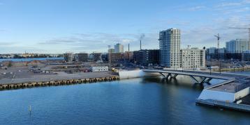 Buildings in industrial area next to river bank